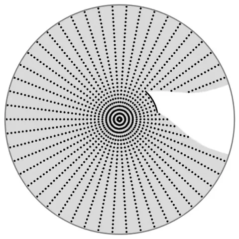 A circular shadow crossing a pale surface